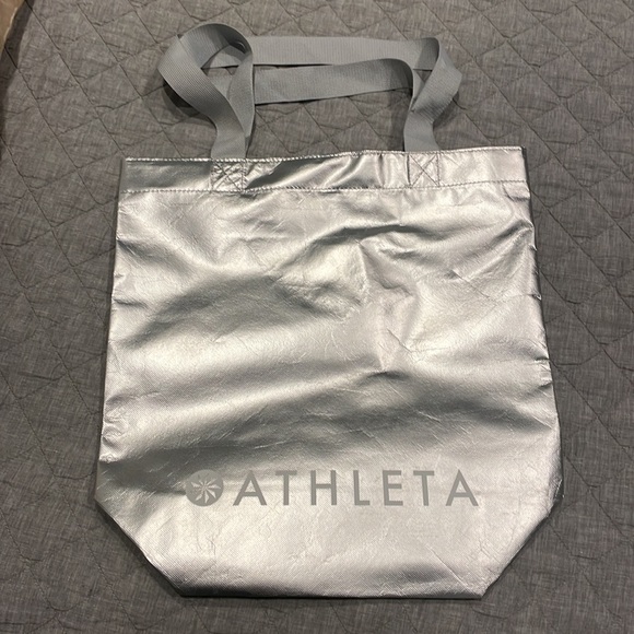 Five Athleta bags: 2 large silver, 1 med metallic red & 2 mix size metallic bags - Picture 2 of 4